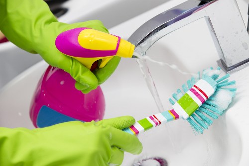 Treating a rug stain carefully with blotting and gentle cleaning